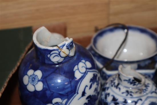 A large collection of 19th century Chinese blue and white vases, bowls, etc. and two famille rose pots